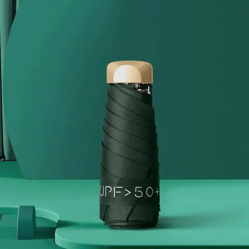 women's UV protection parasol in stylish black design with UPF > 50 label for ultimate sun protection.