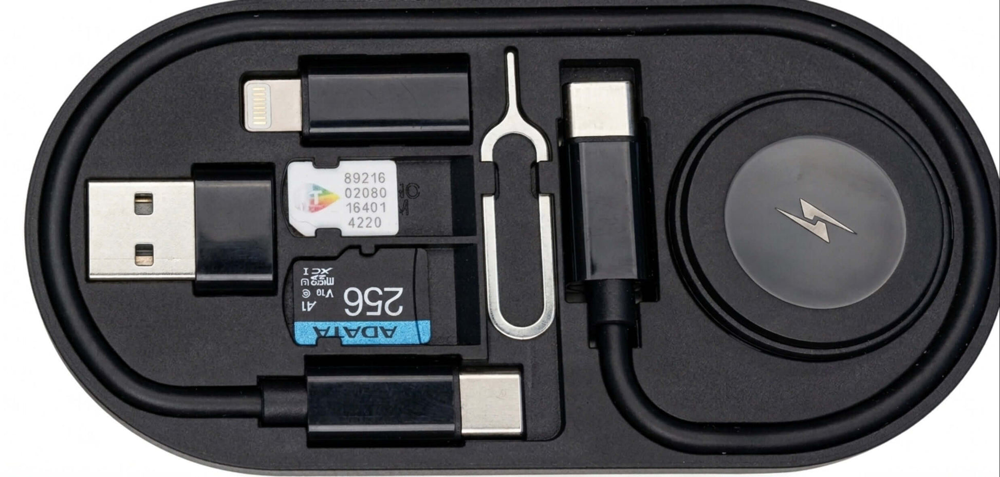 All-in-One Charge Card by Techs Park with cables and adapters organized in a compact case for charging on the go.
