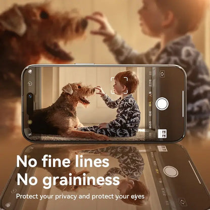 Joyroom Anti-spy Glass For iPhone protects your privacy while displaying a child interacting with a dog.