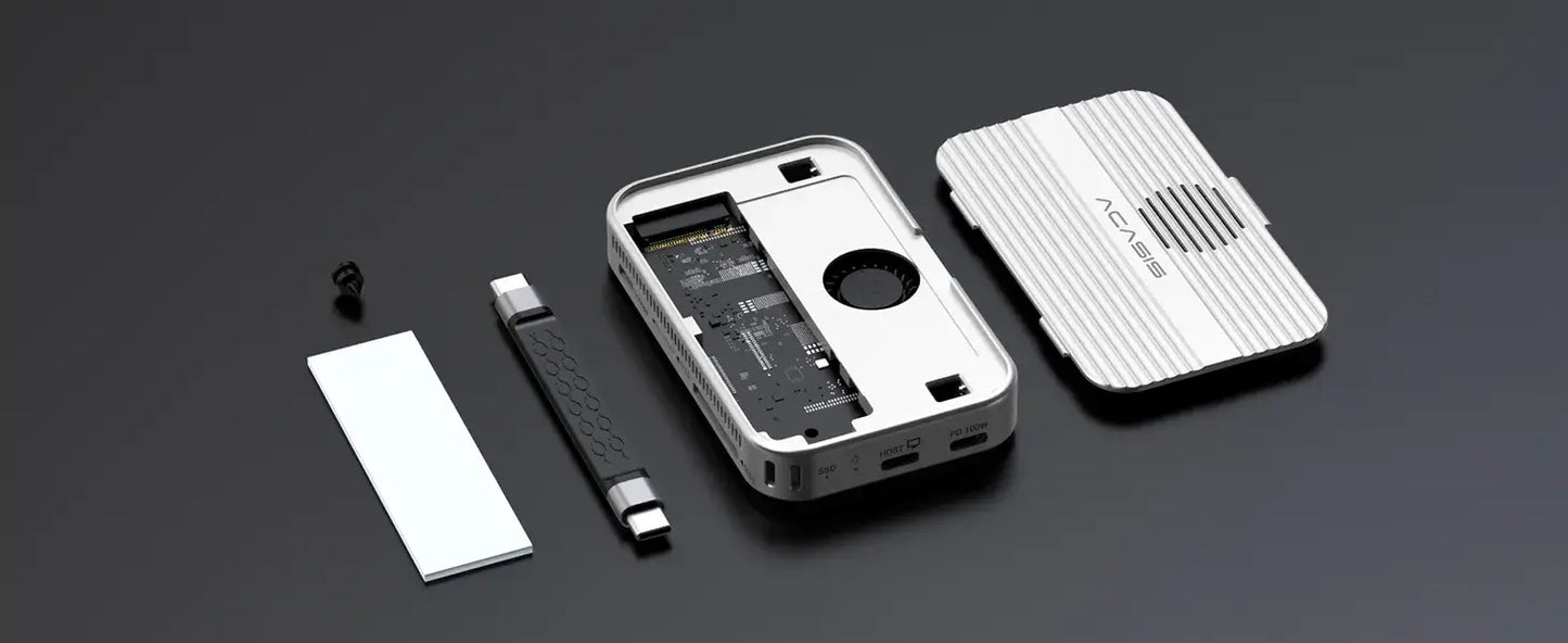 Acasis 10 Gbps Magnetic M.2 NVMe SSD Enclosure – USB-C Dock 4 K Hub components laid out on a black surface.