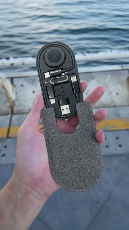All-in-One Charge Card by Techs Park displayed in hand, showcasing compact, sleek design with charging cables.