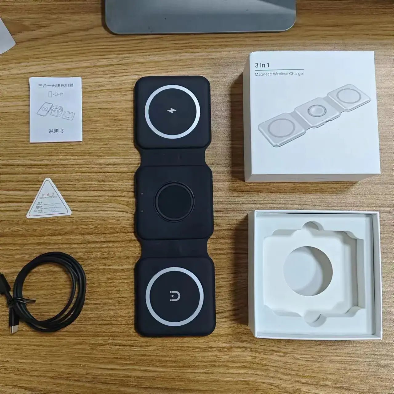 Portable Multi-Function MagSafe Wireless Charger laid out with instruction manual, charging cable, and packaging.